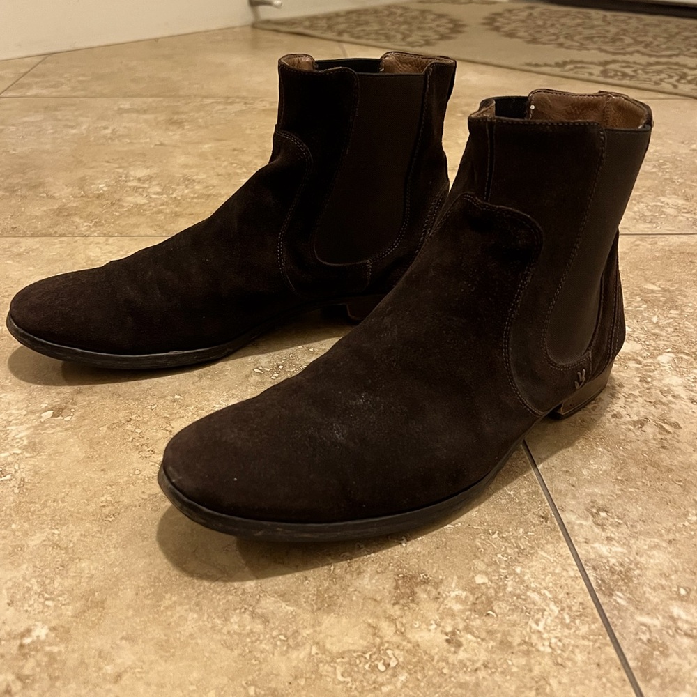 Worn but in mint condition stylish leather boots .